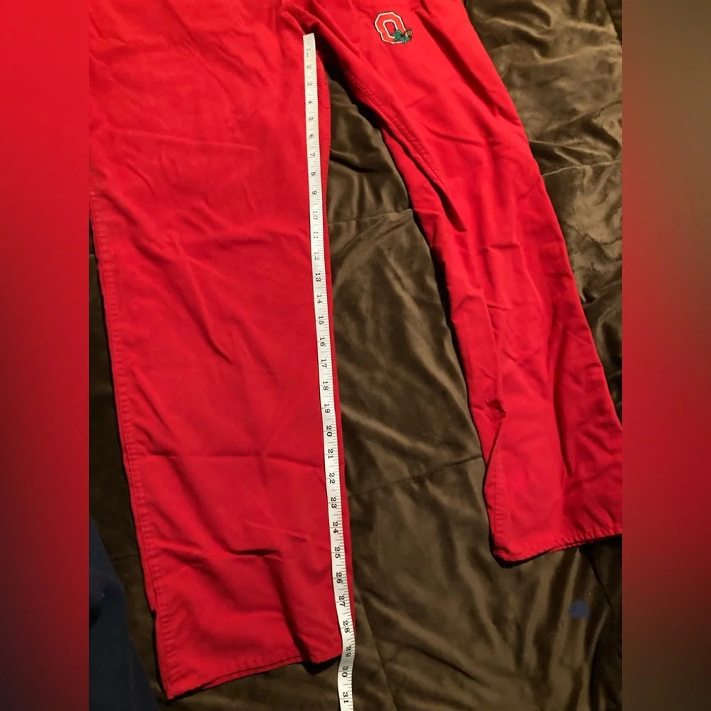 Red Ohio State Buckeyes scrub pants, size medium, small stain under pocket
